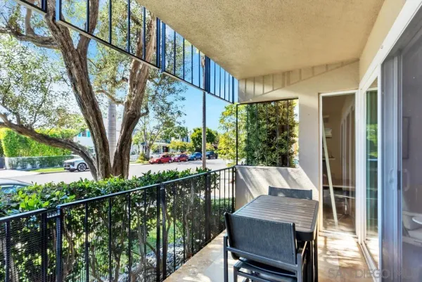 a view of balcony with furniture and wooden deck
