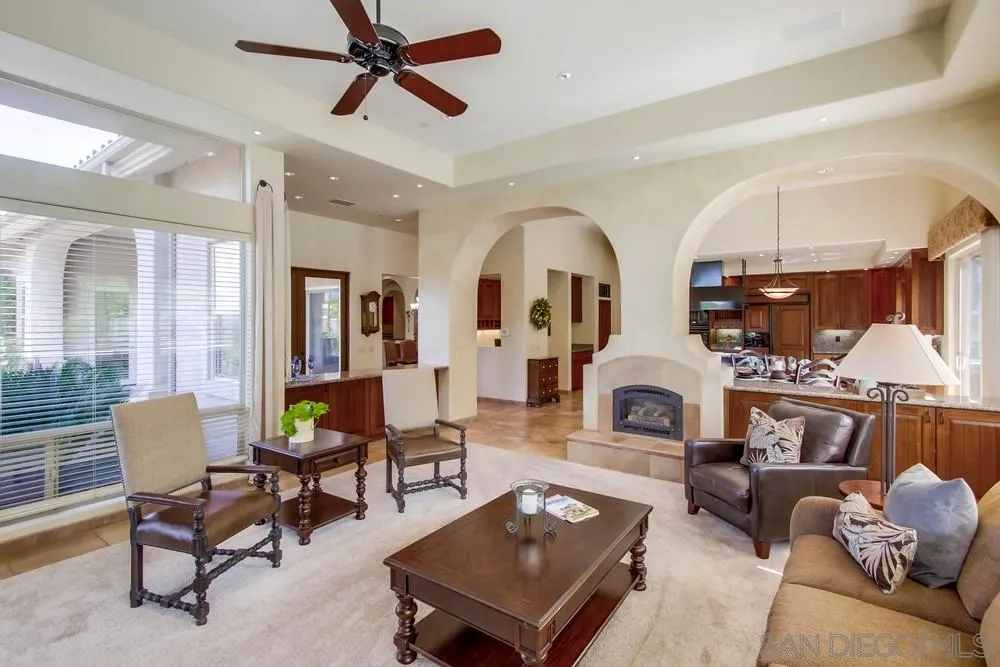15730 Bowl Creek Road Poway, CA 92064 - Photo 8 of 25 a living room with furniture and a fireplace