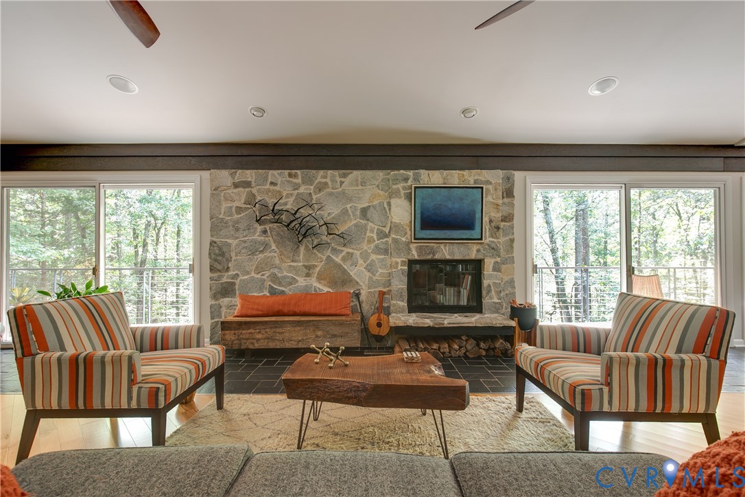 380 Flag Station Road Henrico, VA 23238 - Photo 11 of 70 a living room with furniture and a floor to ceiling window
