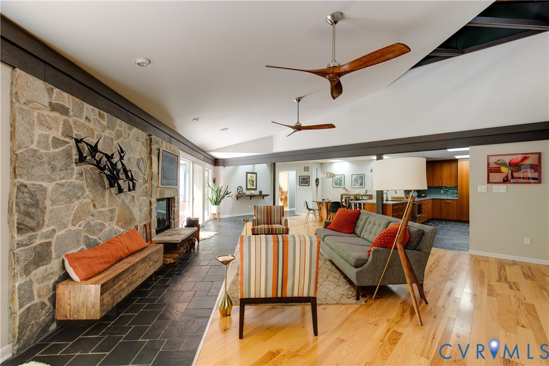 380 Flag Station Road Henrico, VA 23238 - Photo 12 of 70 a living room with patio furniture and a wooden floor