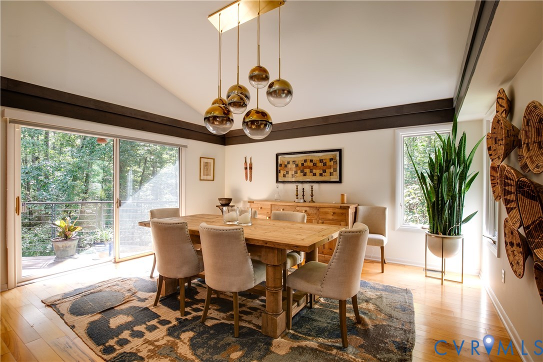 380 Flag Station Road Henrico, VA 23238 - Photo 27 of 70 a view of a dining room with furniture window and wooden floor