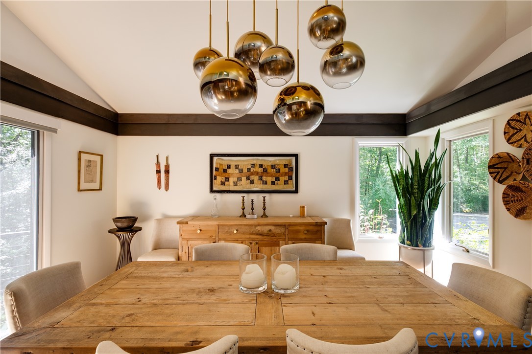 380 Flag Station Road Henrico, VA 23238 - Photo 28 of 70 a view of a dining room with furniture and chandelier