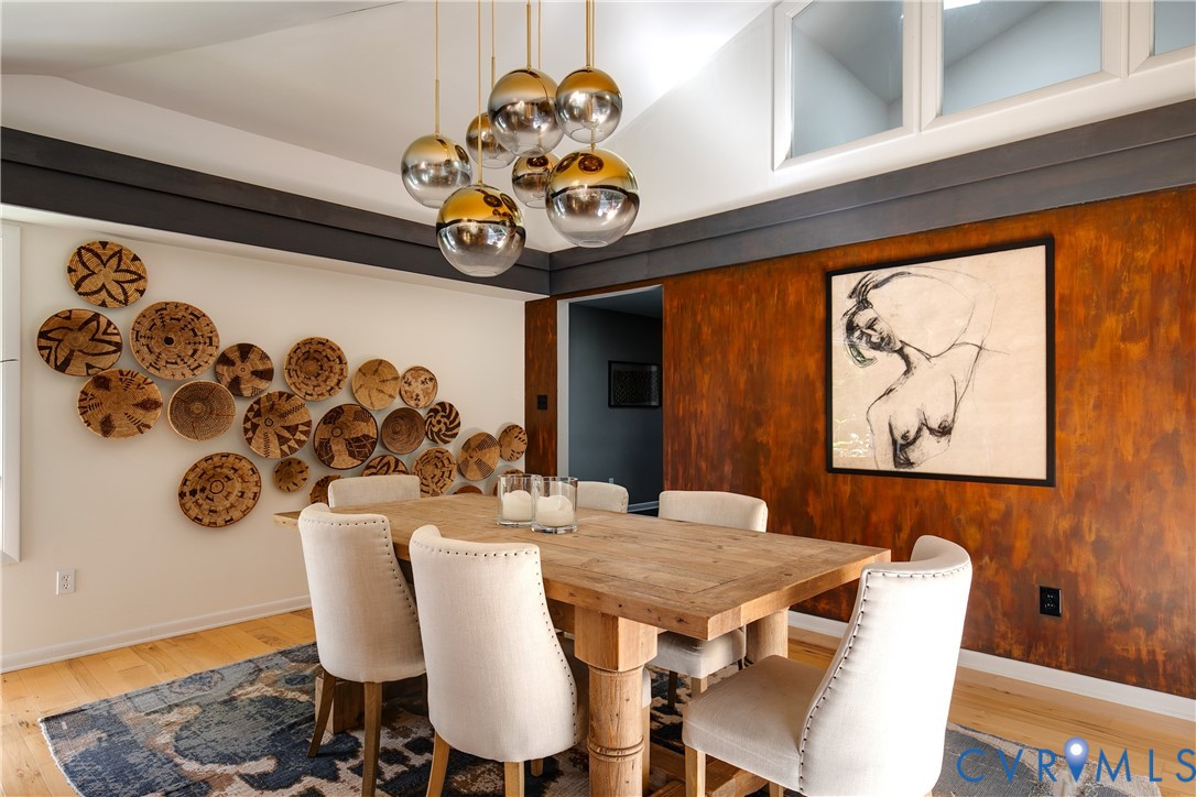 380 Flag Station Road Henrico, VA 23238 - Photo 29 of 70 a view of a dining room with furniture and wooden floor