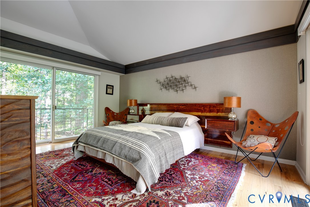 380 Flag Station Road Henrico, VA 23238 - Photo 31 of 70 a bedroom with a bed and wooden floor