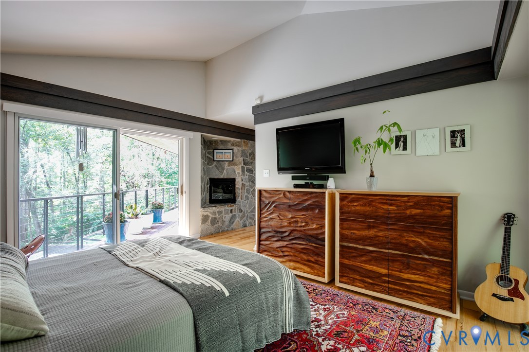 380 Flag Station Road Henrico, VA 23238 - Photo 32 of 70 a bedroom with a bed and flat screen tv