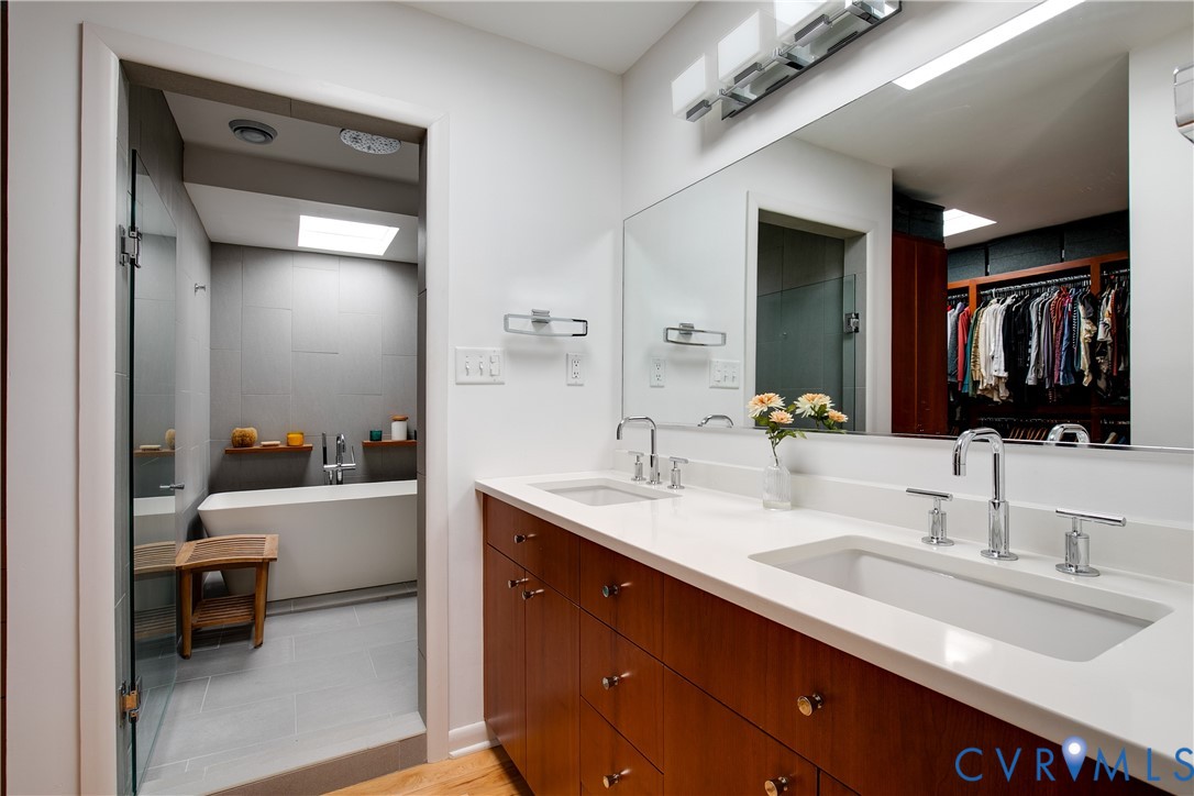 380 Flag Station Road Henrico, VA 23238 - Photo 35 of 70 a en suite bathroom with a double vanity sink and a mirror
