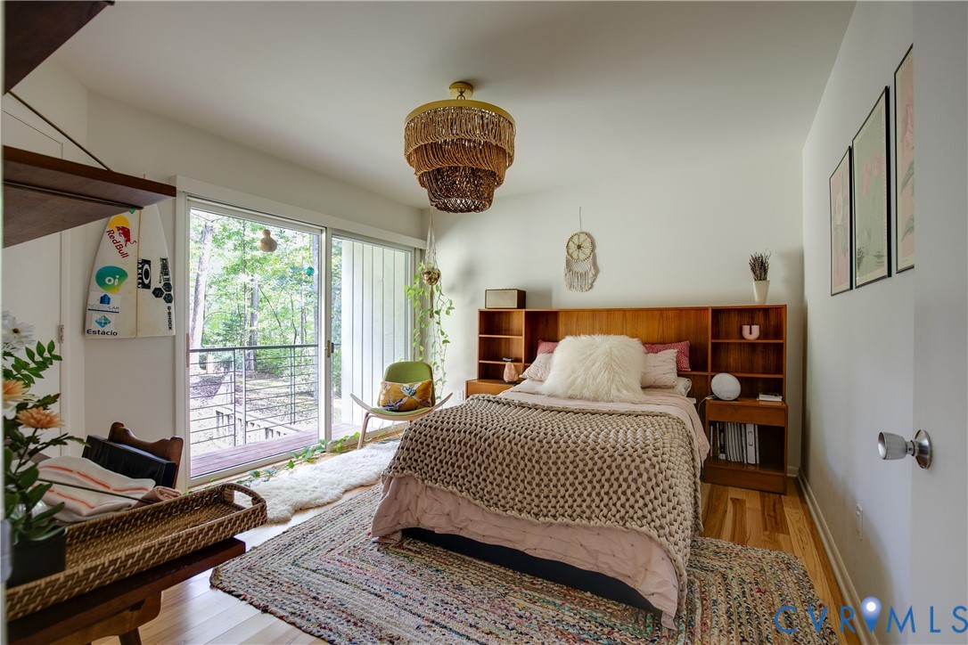 380 Flag Station Road Henrico, VA 23238 - Photo 39 of 70 a bedroom with a bed and a window