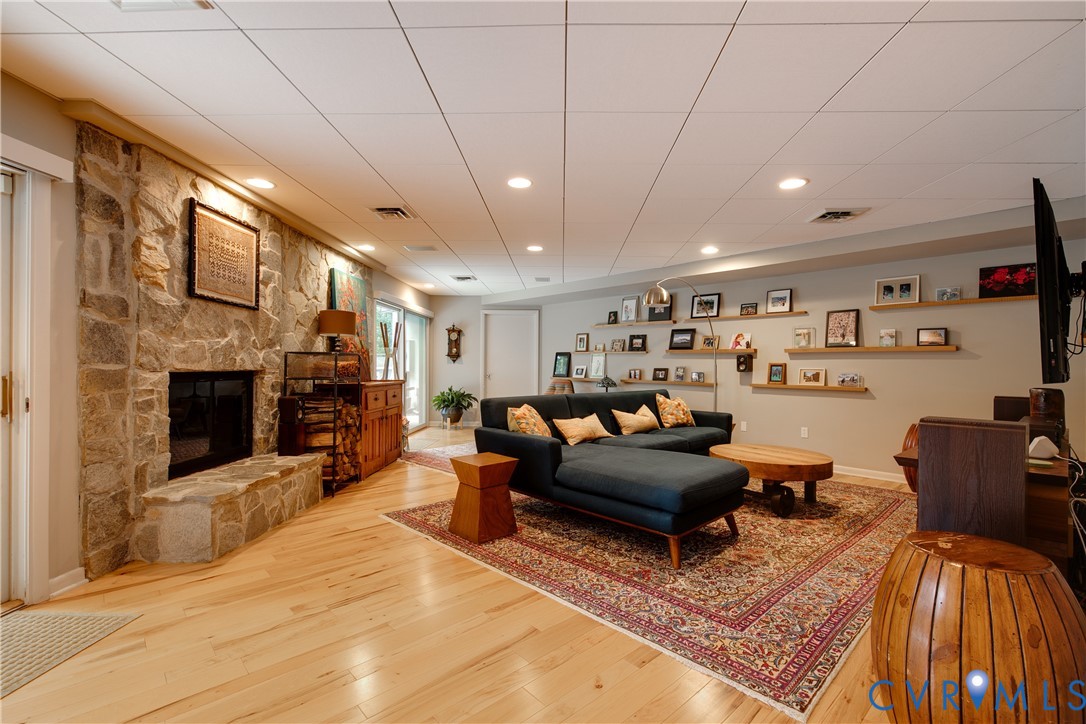 380 Flag Station Road Henrico, VA 23238 - Photo 47 of 70 a living room with furniture and a fireplace