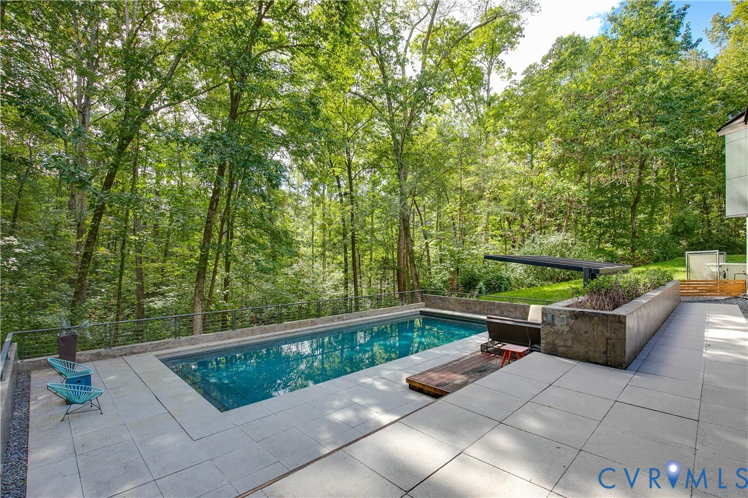 380 Flag Station Road Henrico, VA 23238 - Photo 55 of 70 a view of backyard with outdoor seating and plants