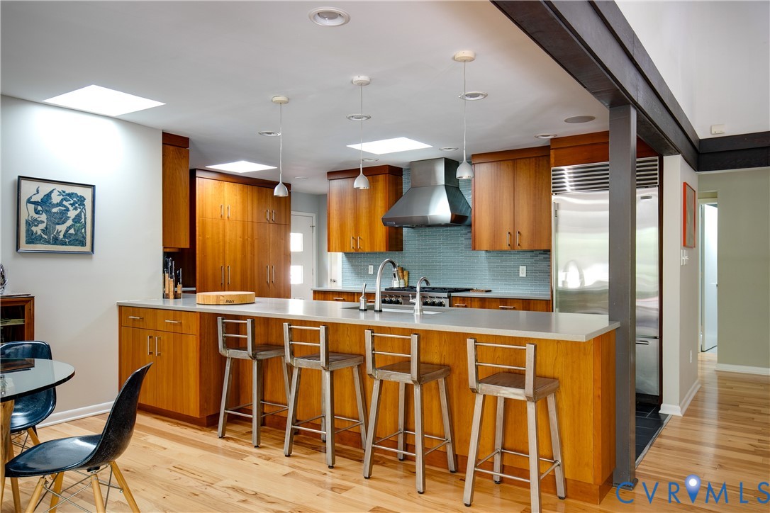 380 Flag Station Road Henrico, VA 23238 - Photo 9 of 70 a large kitchen with a table and chairs