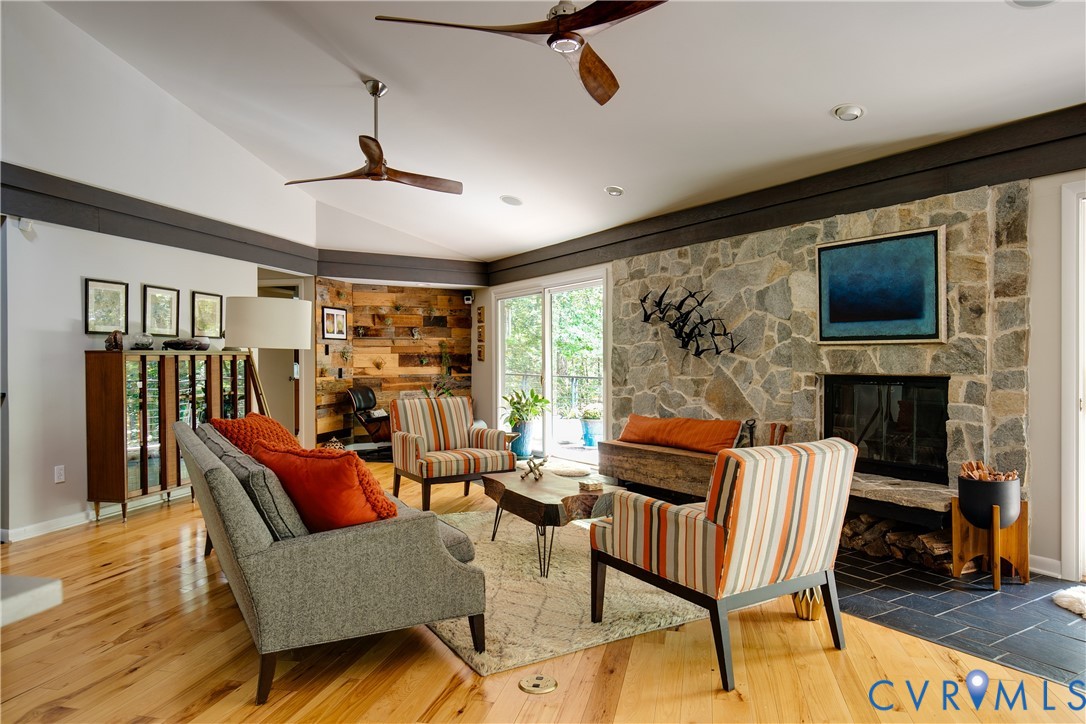 380 Flag Station Road Henrico, VA 23238 - Photo 10 of 70 a living room with fireplace furniture and a flat screen tv