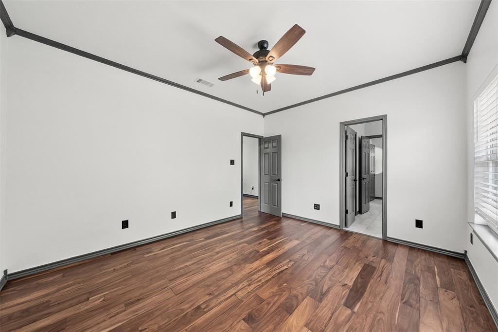 3091 Rockbridge Road McGregor, TX 76657 - Photo 32 of 40 a view of an empty room with wooden floor