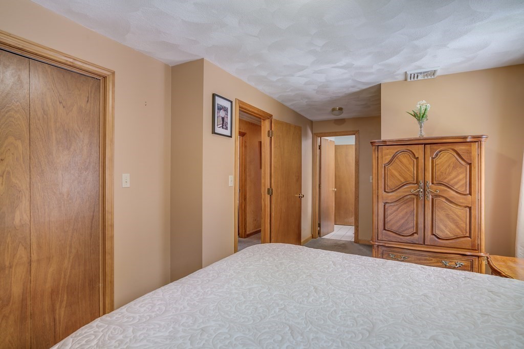 1109 Whipple Road Tewksbury, MA 01876 - Photo 10 of 25 a view of an empty room with window and bathroom
