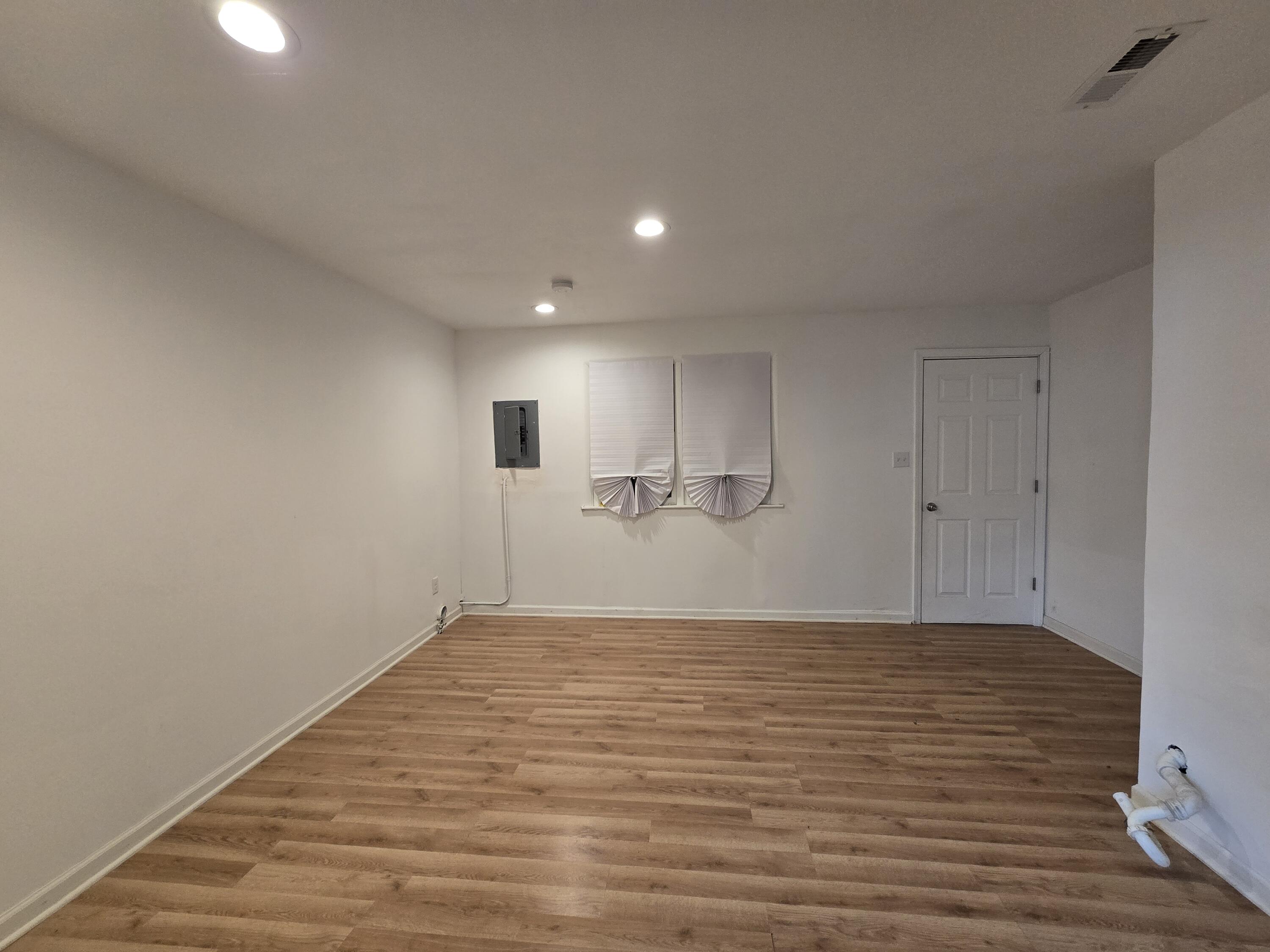 2128 Tennessee Street Gary, IN 46407 - Photo 17 of 26 a view of empty room with wooden floor