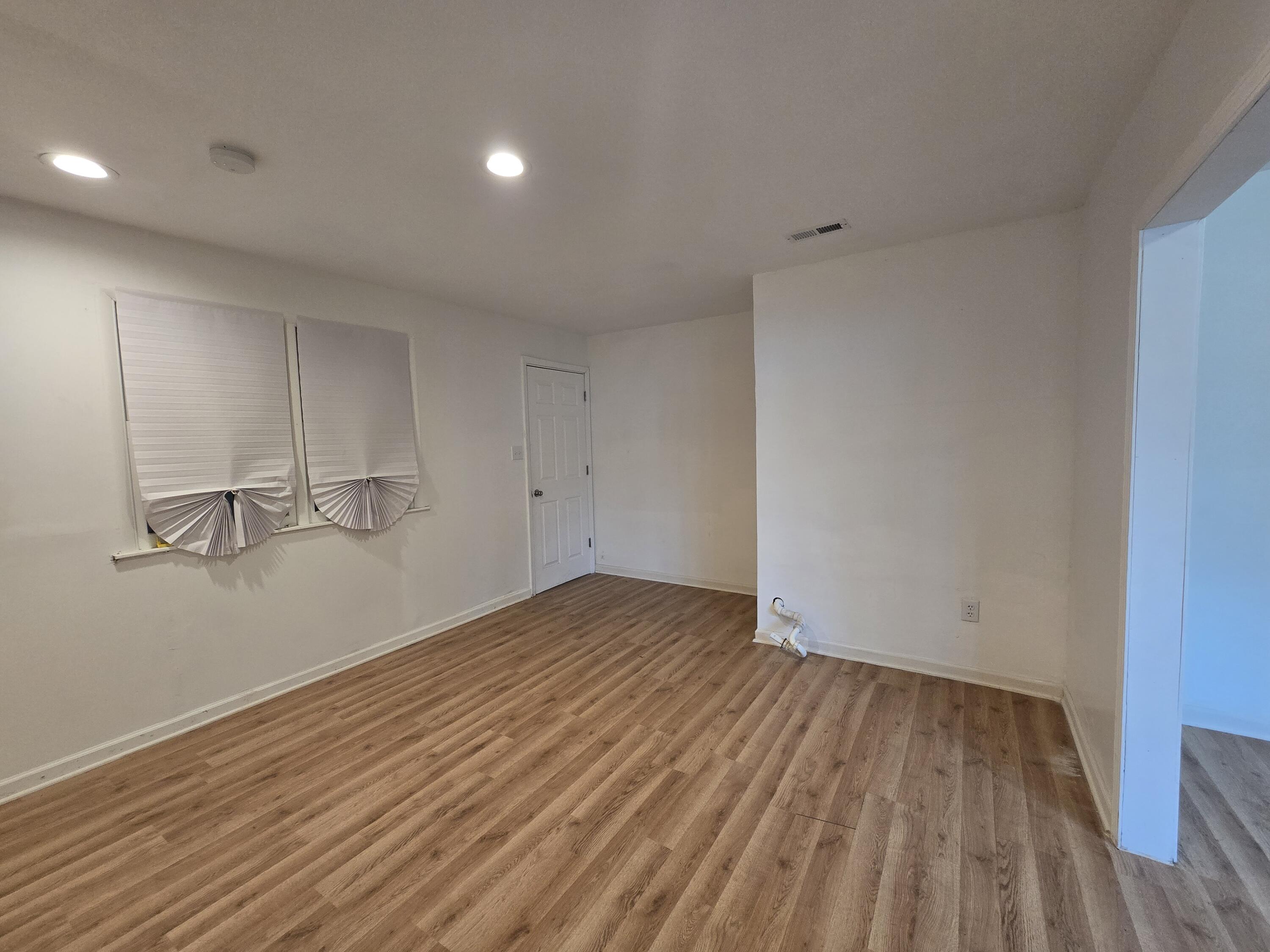 2128 Tennessee Street Gary, IN 46407 - Photo 18 of 26 a view of empty room with wooden floor