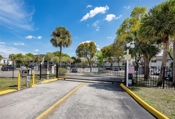 a view of a swimming pool with a lounge chairs