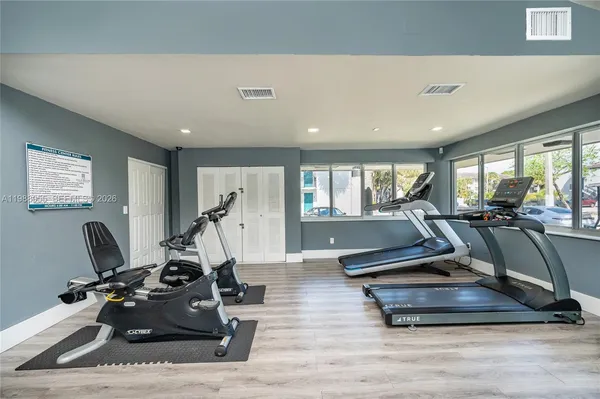 a view of a room with gym equipment