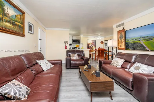 a living room with furniture and a couch