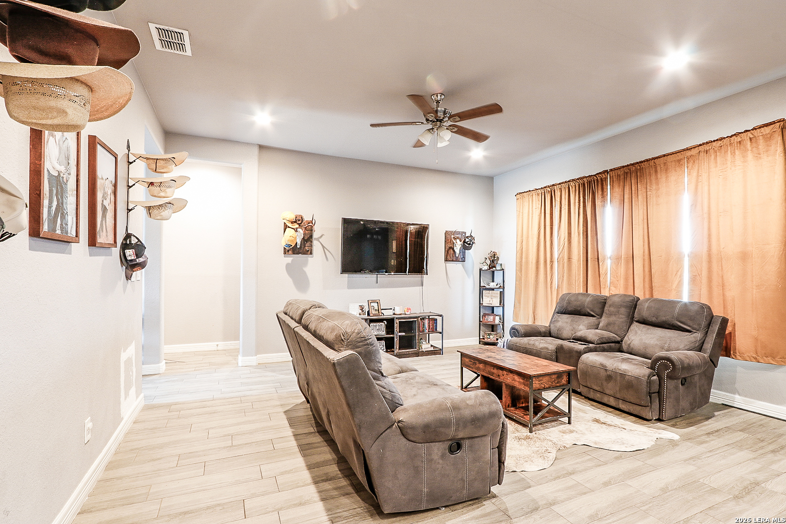 281 Legend Hills Uvalde, TX 78801 - Photo 13 of 24 a living room with furniture and a flat screen tv