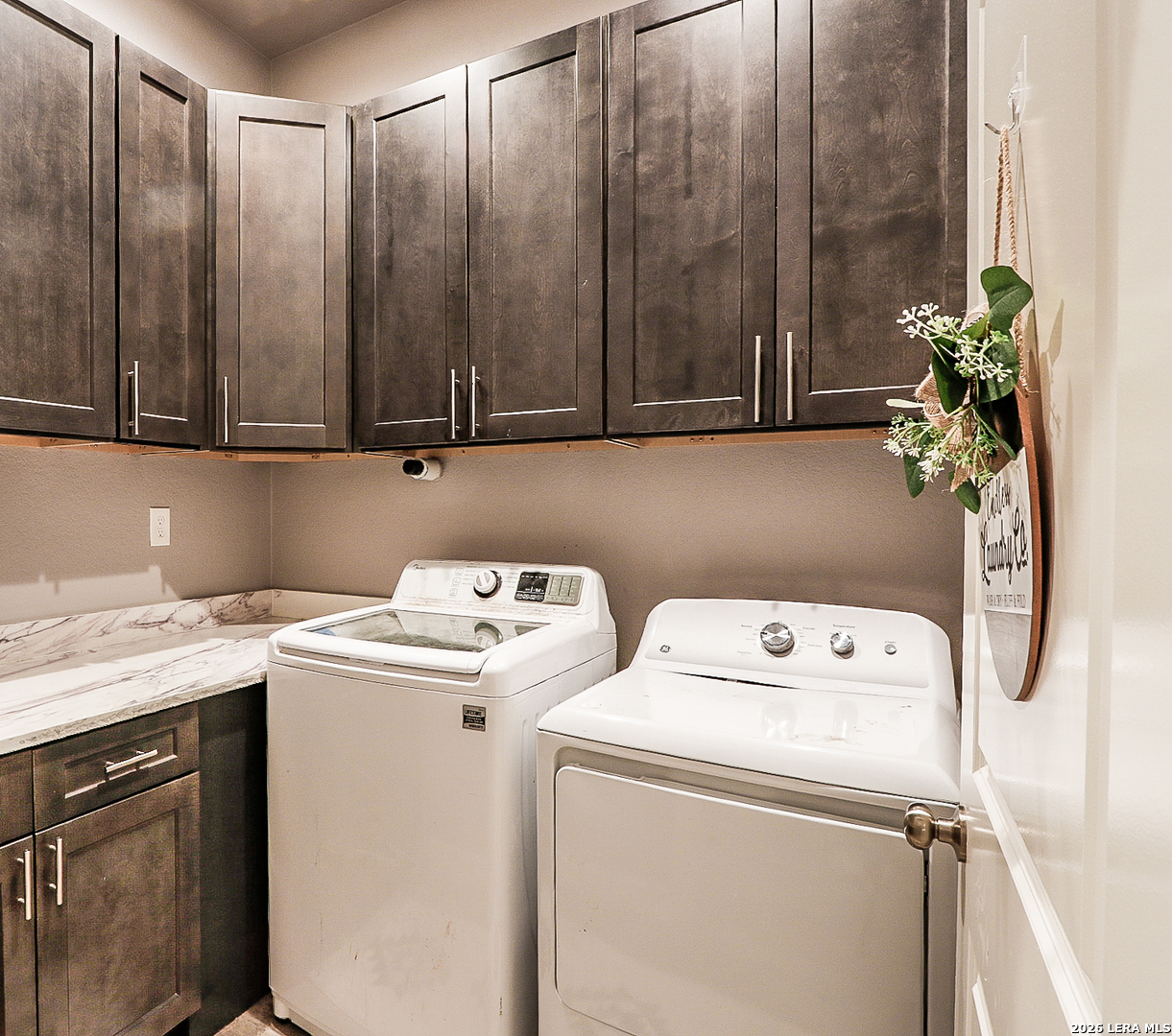 281 Legend Hills Uvalde, TX 78801 - Photo 18 of 24 a utility room with dryer and washer