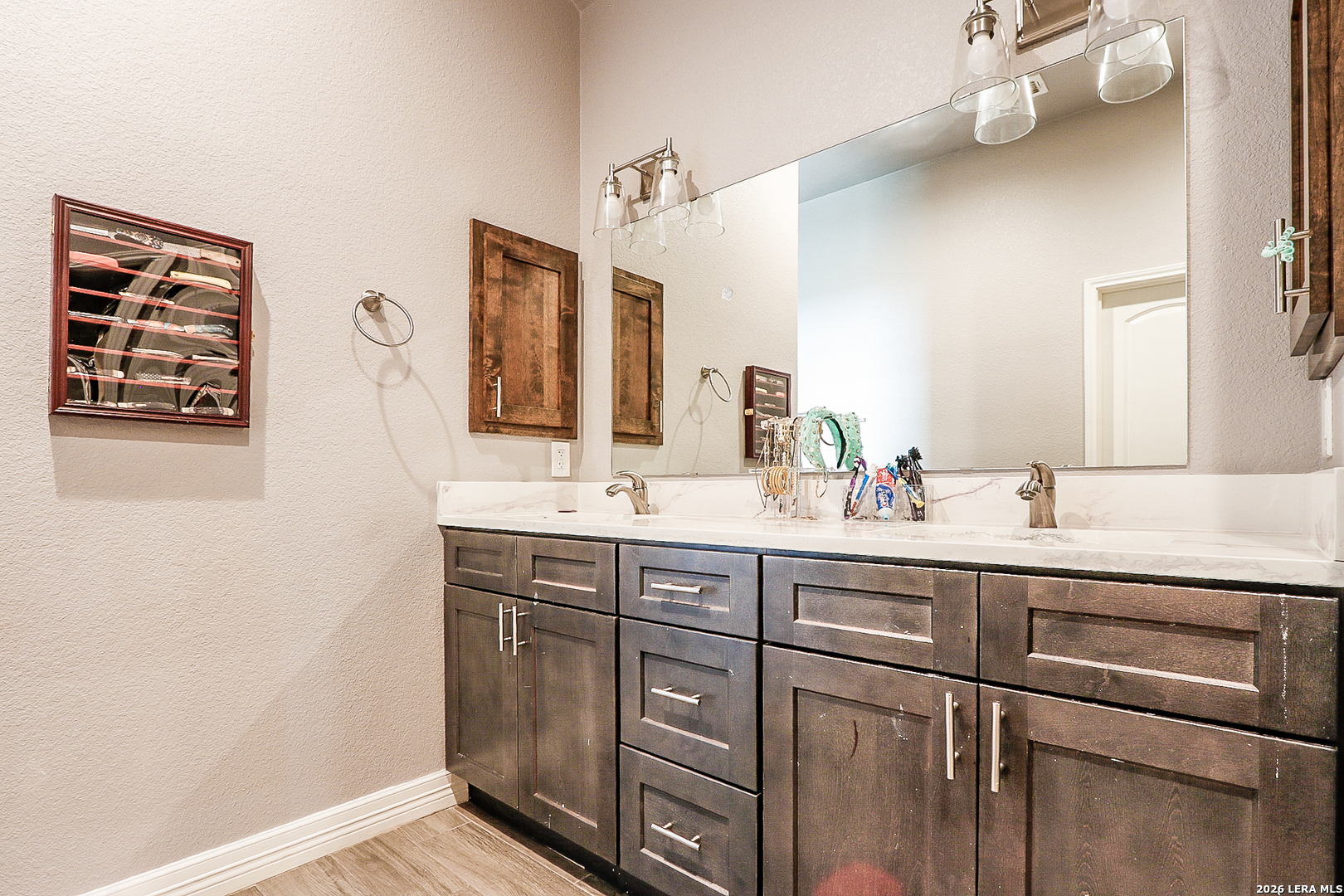 281 Legend Hills Uvalde, TX 78801 - Photo 20 of 24 a bathroom with a sink a vanity and a mirror