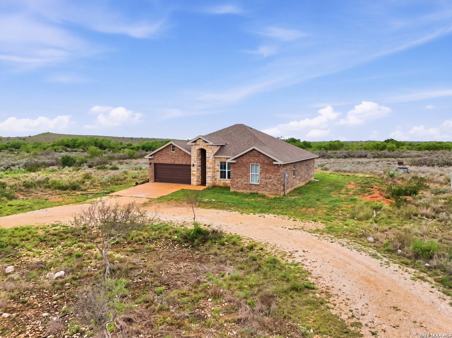281 Legend Hills Uvalde, TX 78801 - Photo 2 of 24 a view of a house with a yard