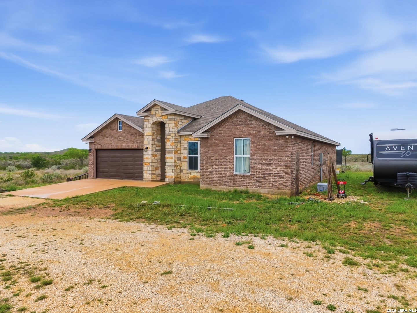 281 Legend Hills Uvalde, TX 78801 - Photo 4 of 24 a view of a house with a yard