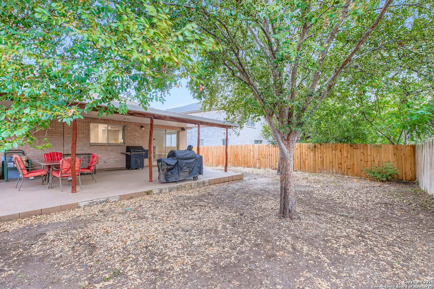 8614 Cross Spring San Antonio, TX 78251 - Photo 23 of 24 a house view with a sitting space and garden