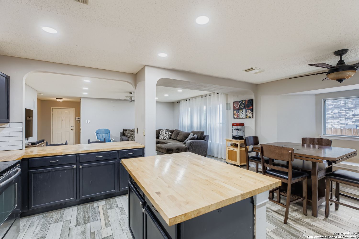 8614 Cross Spring San Antonio, TX 78251 - Photo 10 of 24 a large kitchen with a table and chairs