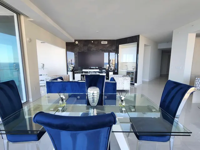 a view of a dining room with furniture