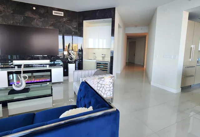a view of kitchen with oven and cabinets