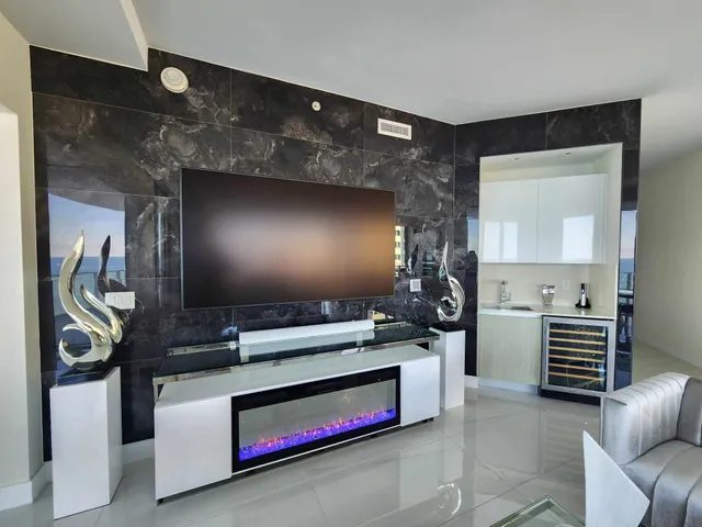 a kitchen with furniture and a stove