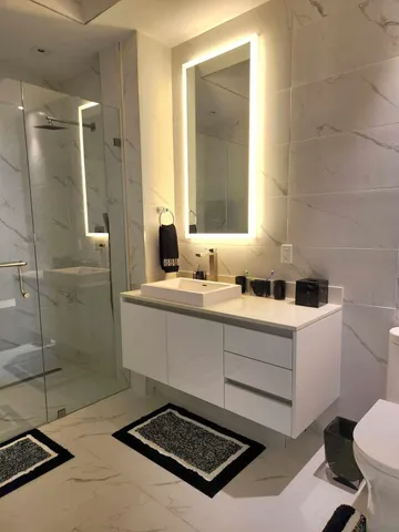 a view of a room with a large window