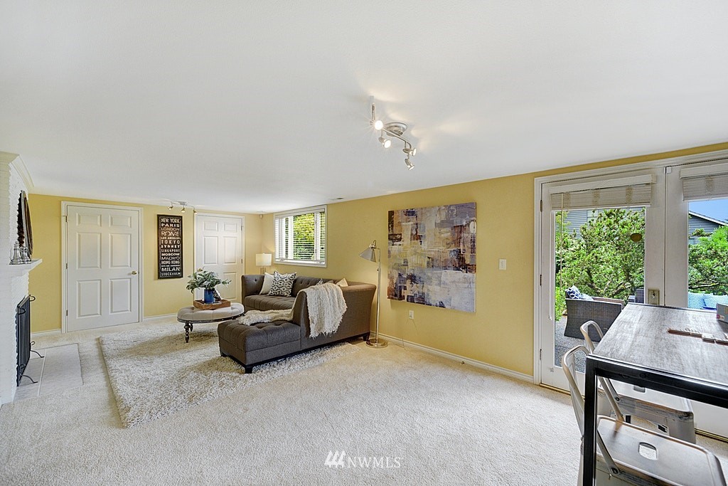 4402 Southwest Rose Street Seattle, WA 98136 - Photo 14 of 20 a living room with furniture and a window