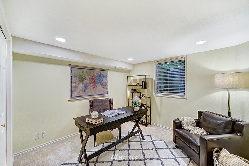 4402 Southwest Rose Street Seattle, WA 98136 - Photo 19 of 20 a living room with furniture and a window