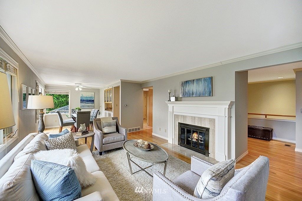 4402 Southwest Rose Street Seattle, WA 98136 - Photo 4 of 20 a living room with furniture fireplace and a window