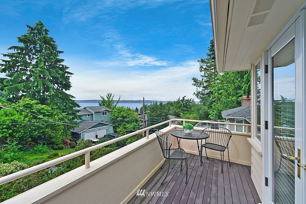4402 Southwest Rose Street Seattle, WA 98136 - Photo 9 of 20 a view of a balcony with chairs
