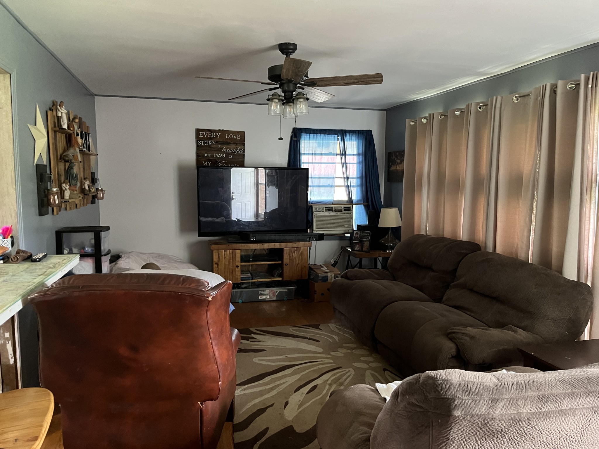 1701 Willette Road Red Boiling Springs, TN 37150 - Photo 7 of 12 a living room with furniture and a flat screen tv