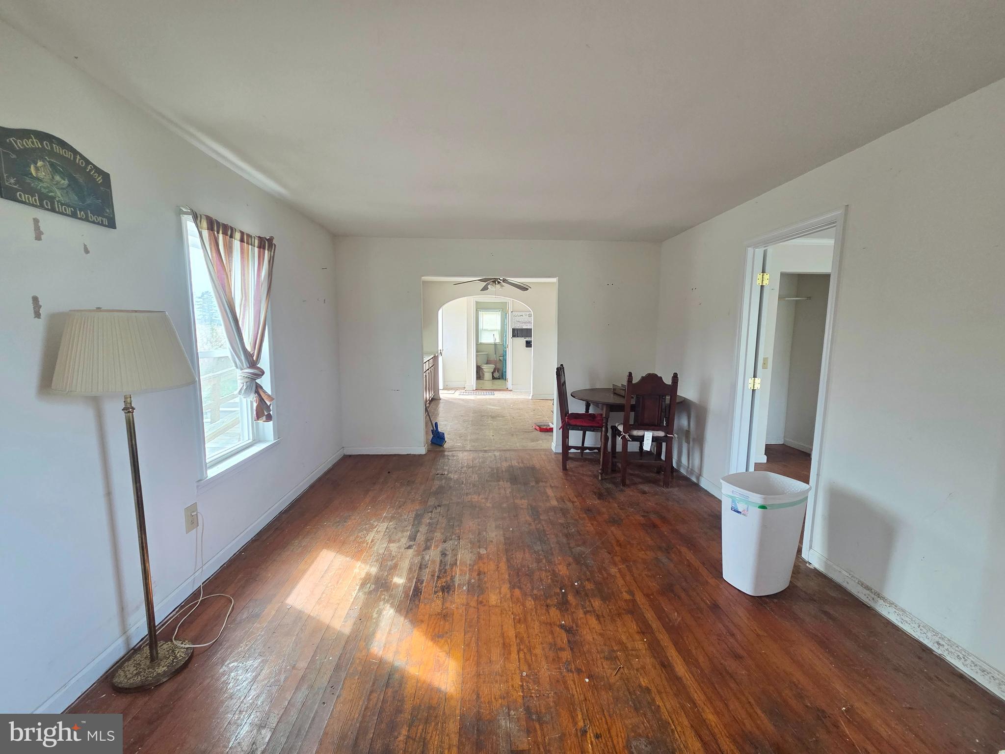 2703 Toddville Road Toddville, MD 21672 - Photo 12 of 24 a living room with furniture and a wooden floor