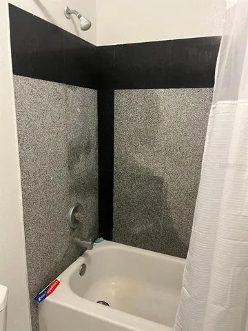 a bathroom with a bathtub