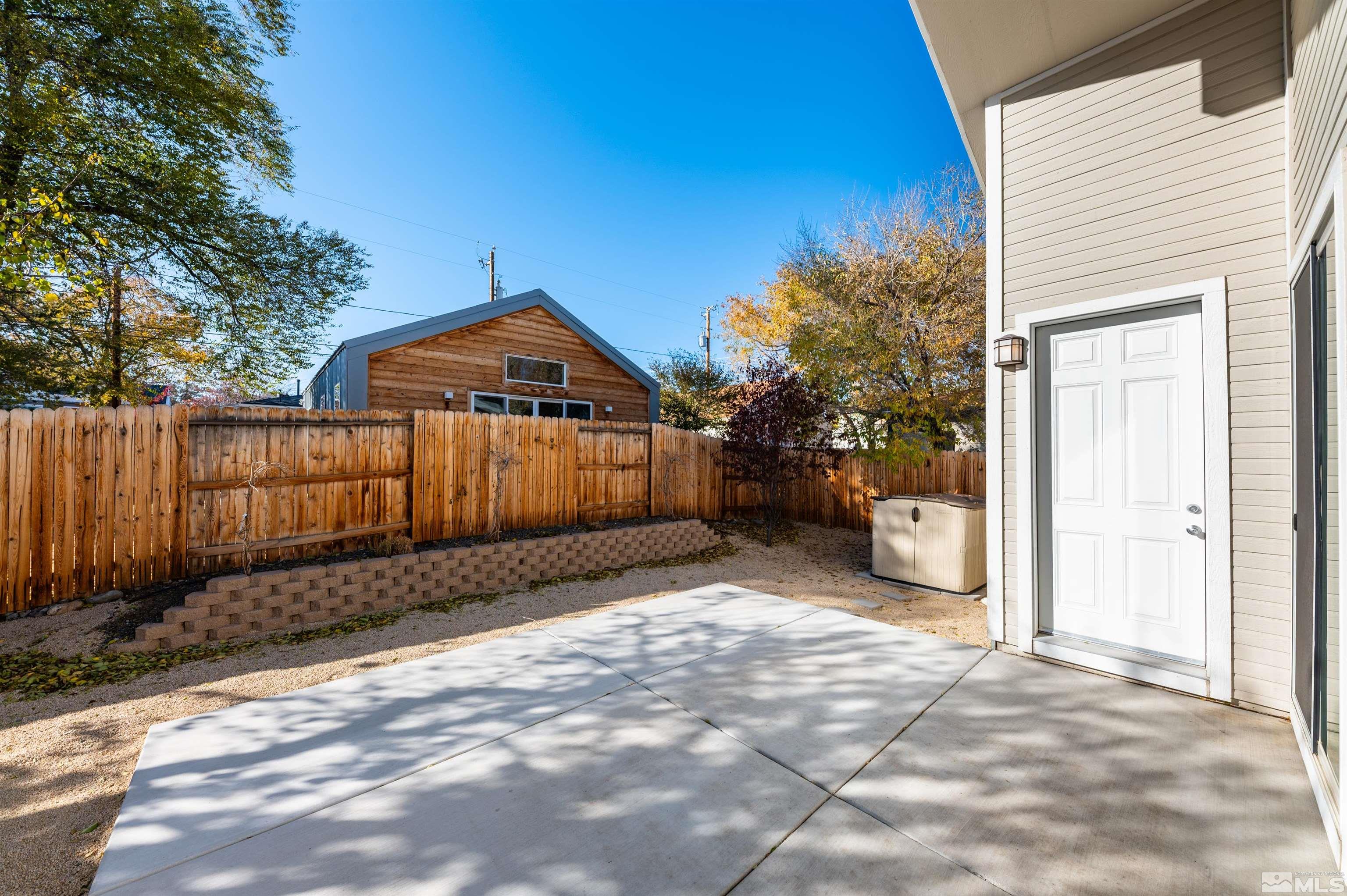 1217 Lander Street Reno, NV 89509 - Photo 16 of 21 a front view of a house with a yard