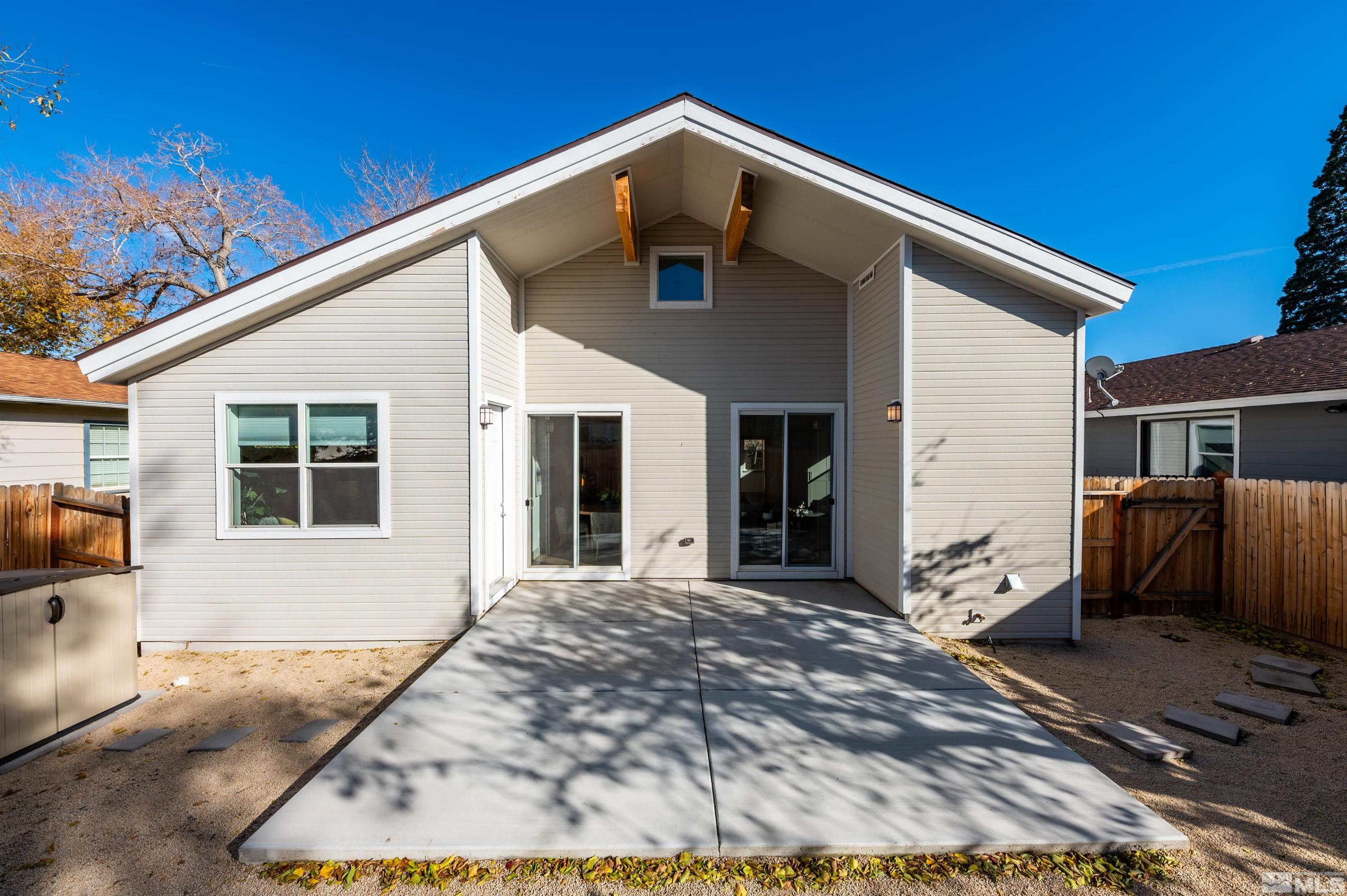 1217 Lander Street Reno, NV 89509 - Photo 17 of 21 a front view of a house with a yard