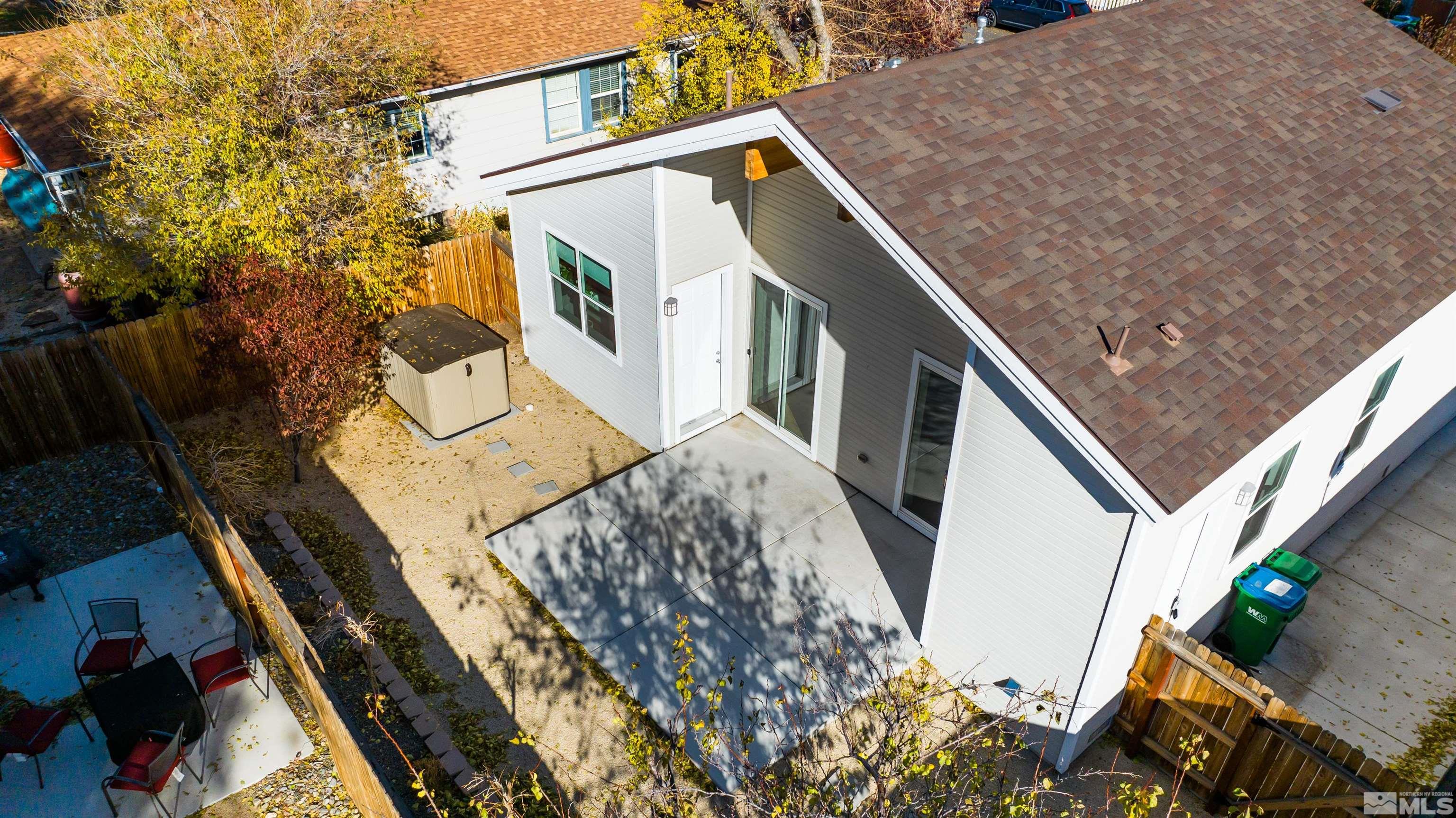 1217 Lander Street Reno, NV 89509 - Photo 18 of 21 a view of a house with backyard and deck