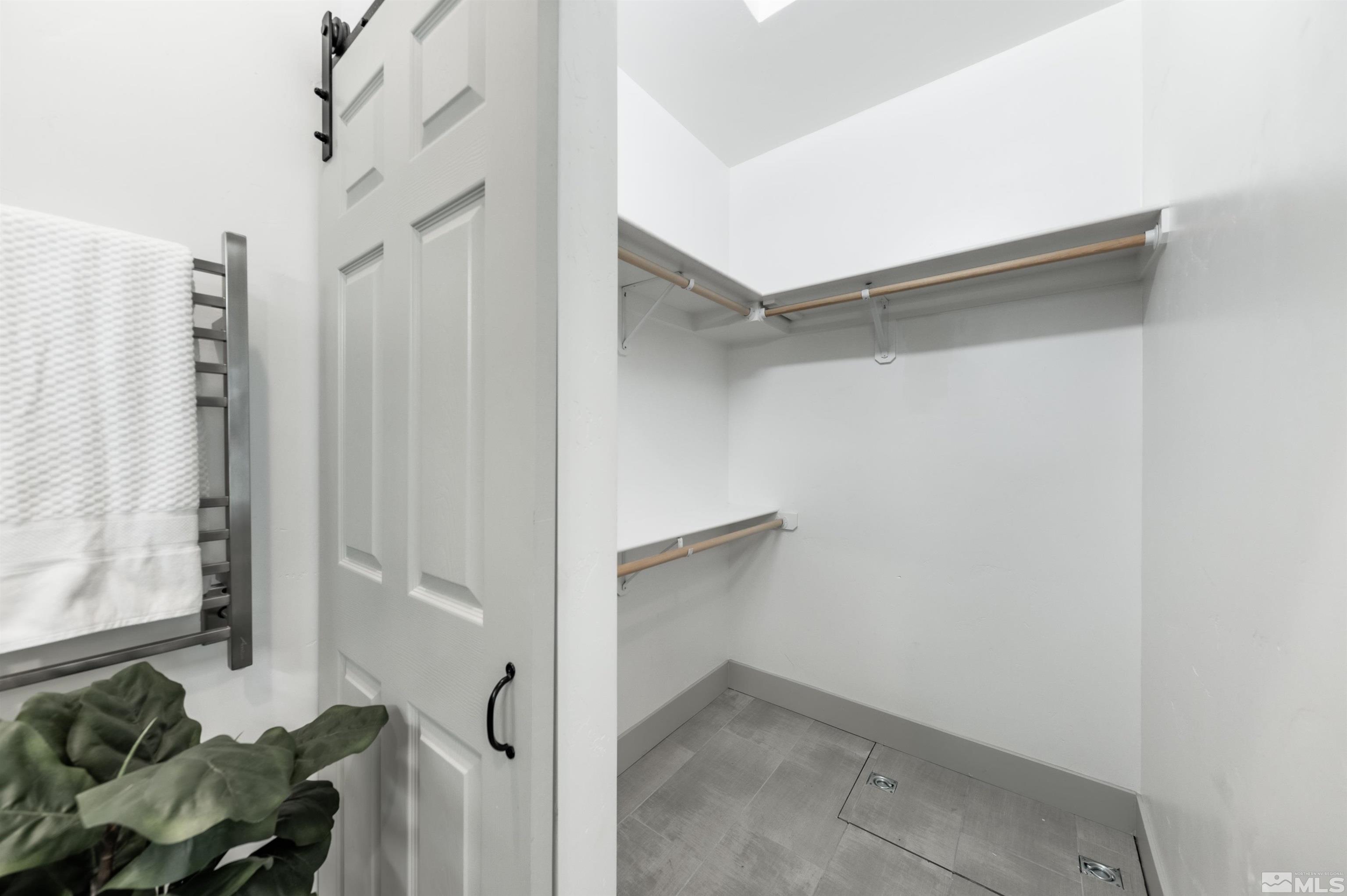 1217 Lander Street Reno, NV 89509 - Photo 10 of 21 a view of walk in closet with clothes and shoes