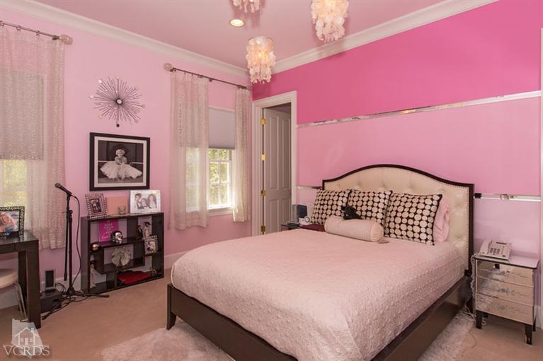 2702 Ladbrook Way Thousand Oaks, CA 91361 - Photo 22 of 45 a bedroom with a bed and a chandelier