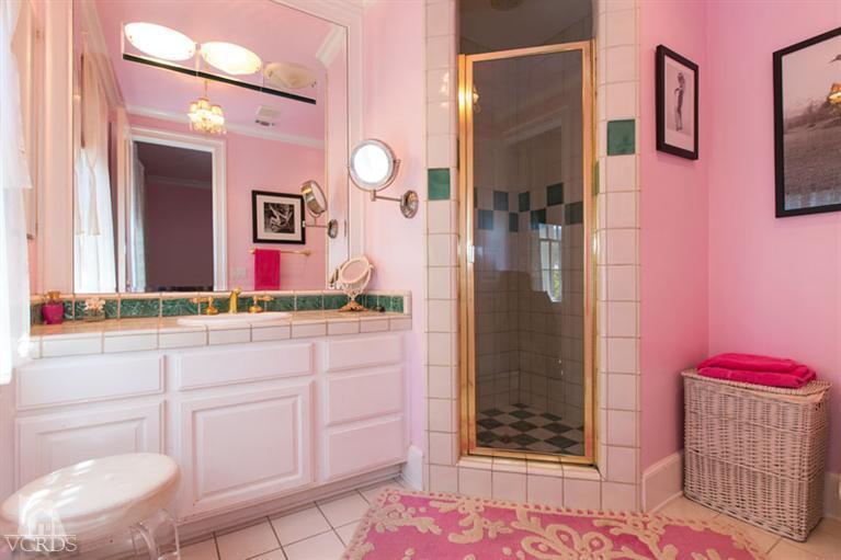 2702 Ladbrook Way Thousand Oaks, CA 91361 - Photo 23 of 45 a bathroom with a sink vanity and mirror