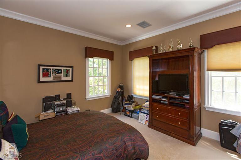 2702 Ladbrook Way Thousand Oaks, CA 91361 - Photo 24 of 45 a living room with furniture and a flat screen tv