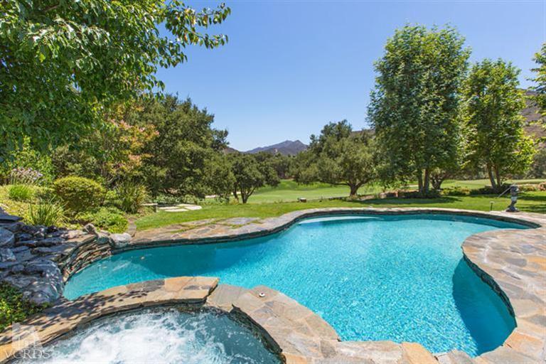 2702 Ladbrook Way Thousand Oaks, CA 91361 - Photo 31 of 45 a view of a swimming pool with a yard