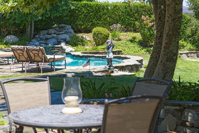 2702 Ladbrook Way Thousand Oaks, CA 91361 - Photo 32 of 45 a backyard of a house with outdoor seating