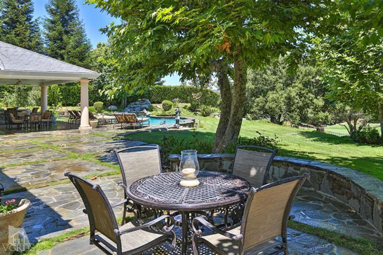 2702 Ladbrook Way Thousand Oaks, CA 91361 - Photo 34 of 45 a view of a patio with a table chairs and a backyard